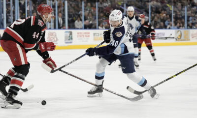 Fedor Svechkov shoots the puck for the Milwaukee Admirals.