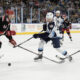 Fedor Svechkov shoots the puck for the Milwaukee Admirals.