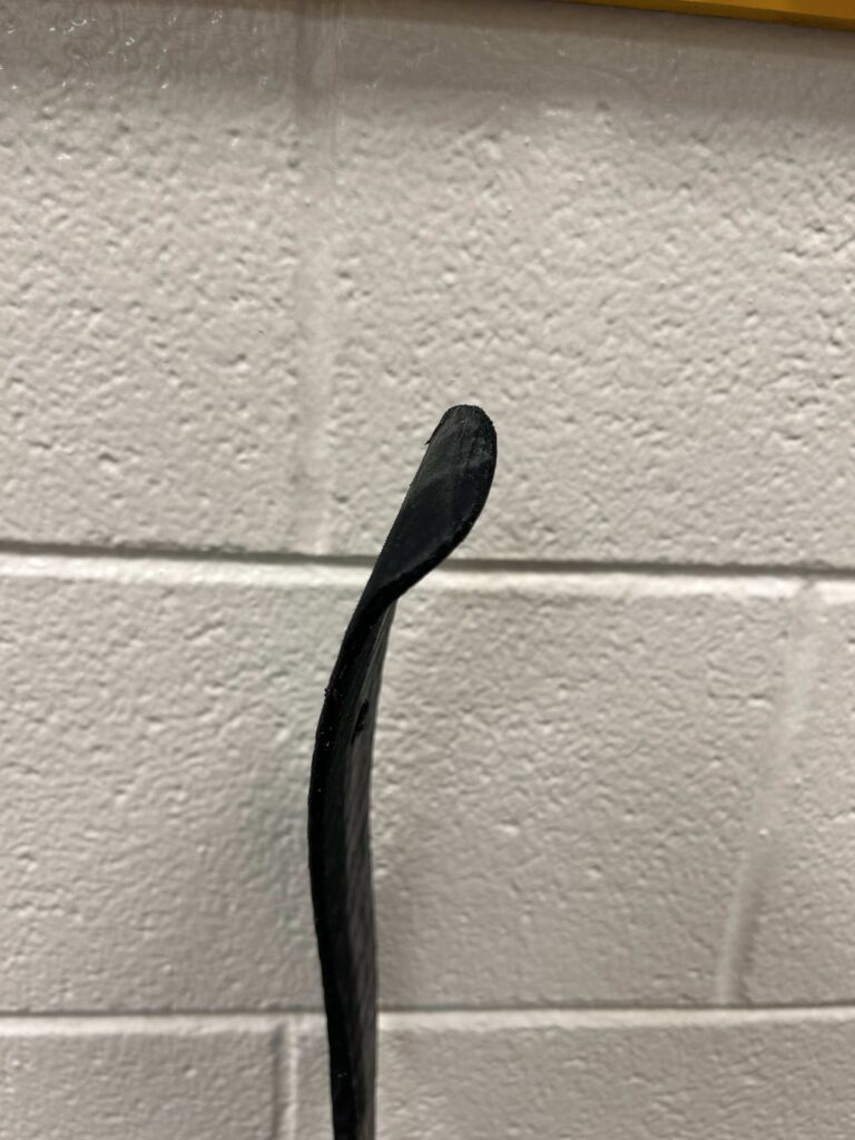 Good tape job? (Faceoff stick) Tape extends from butt end to where
